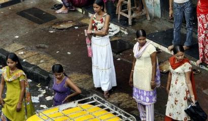 International Women's Day. The real one -- Sex workers in Bombay. They are not unionized, unlike Calcutta, and their HIV rate is 70-80 percent as opposed to 5% in Calcutta's red light district. Bombay mafia, smugglers and film stars do not care.